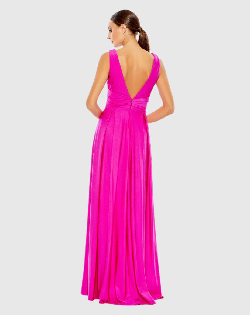 Vestido de noche largo hasta el suelo con escote en V profundo, sin mangas y espalda descubierta con abertura lateral