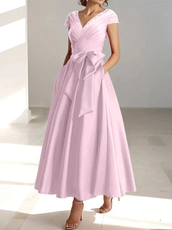 Abiti da mamma della sposa con tasche, scollo a V e stile principessa/a trapezio