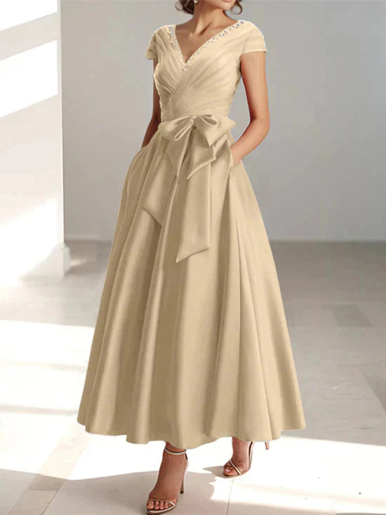 Abiti da mamma della sposa con tasche, scollo a V e stile principessa/a trapezio