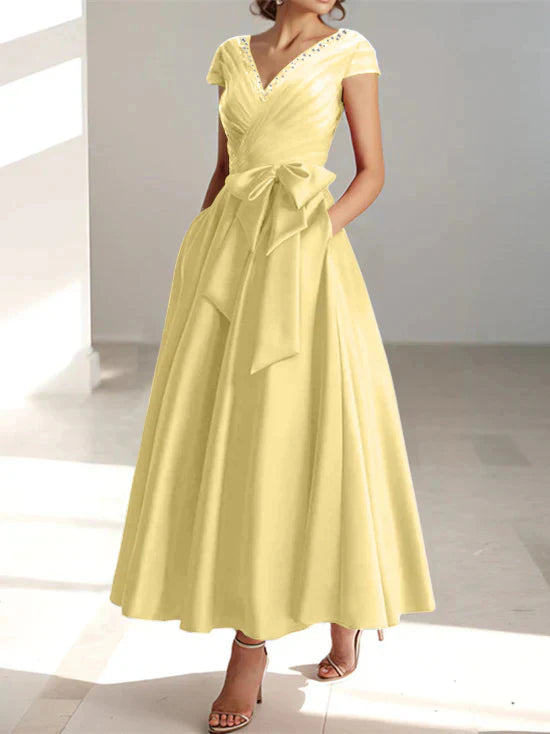 Vestidos de madre de la novia con escote en V, corte A/princesa y bolsillos