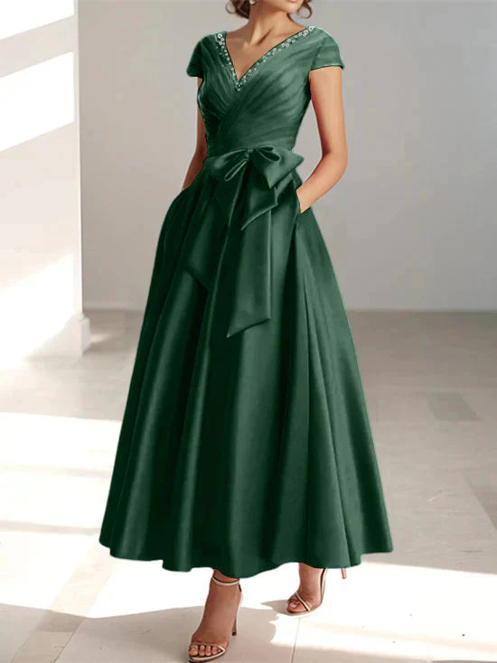 Abiti da mamma della sposa con tasche, scollo a V e stile principessa/a trapezio