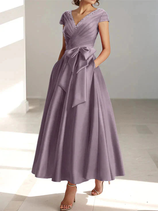 Abiti da mamma della sposa con tasche, scollo a V e stile principessa/a trapezio