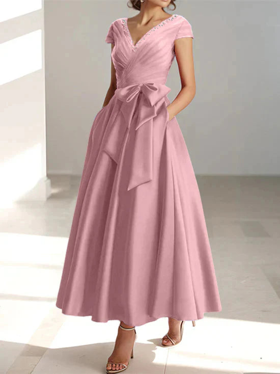 Abiti da mamma della sposa con tasche, scollo a V e stile principessa/a trapezio