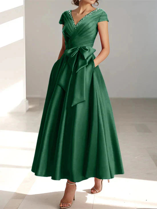 Abiti da mamma della sposa con tasche, scollo a V e stile principessa/a trapezio