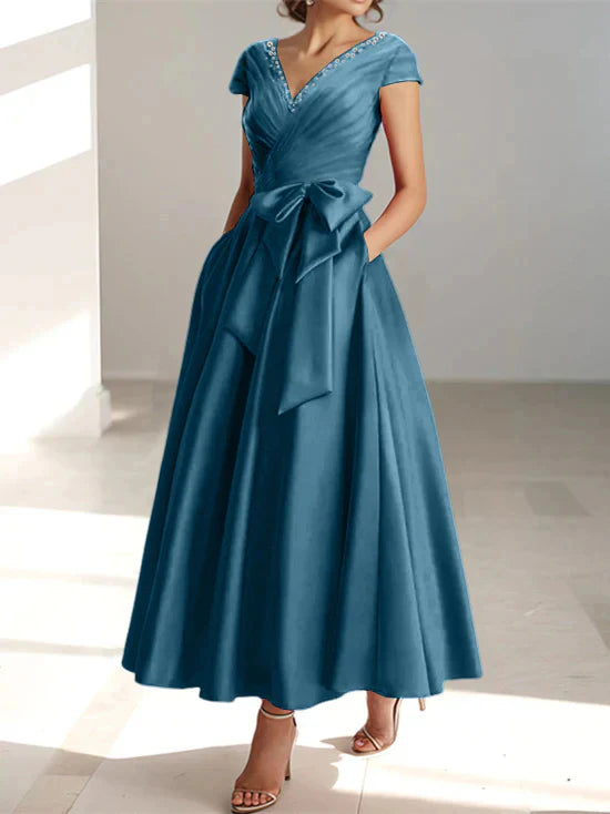 Abiti da mamma della sposa con tasche, scollo a V e stile principessa/a trapezio