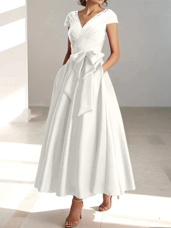 Abiti da mamma della sposa con tasche, scollo a V e stile principessa/a trapezio