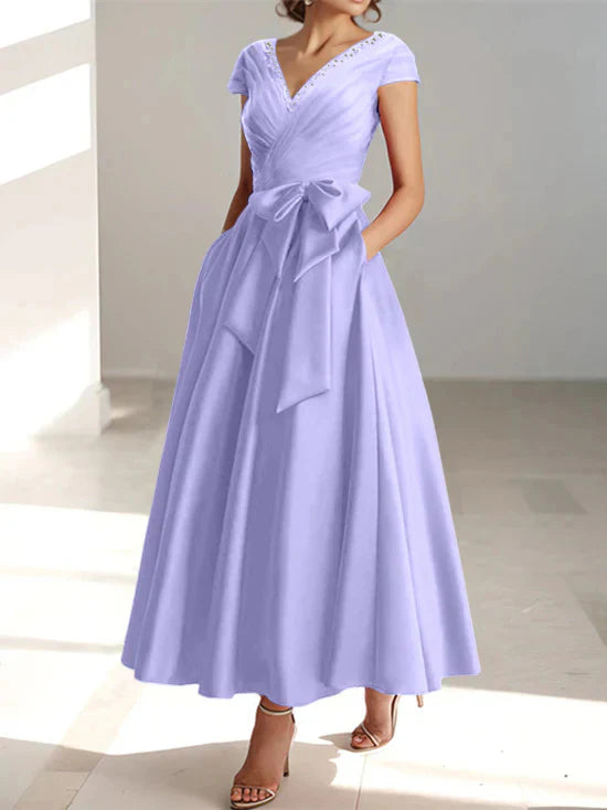 Abiti da mamma della sposa con tasche, scollo a V e stile principessa/a trapezio