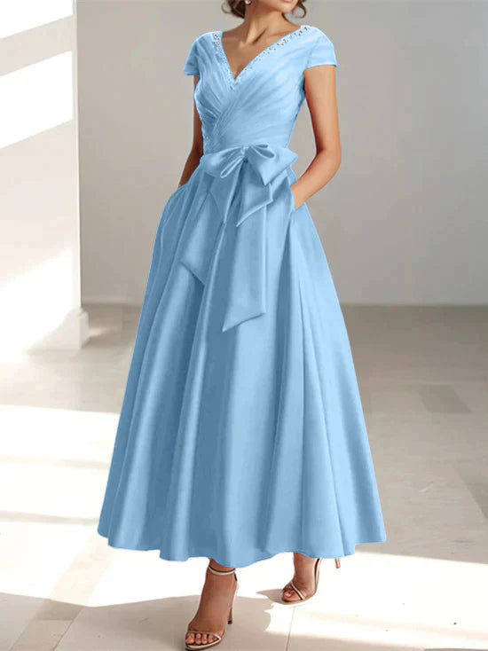 Abiti da mamma della sposa con tasche, scollo a V e stile principessa/a trapezio