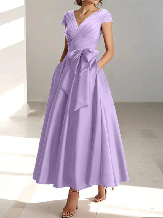 Abiti da mamma della sposa con tasche, scollo a V e stile principessa/a trapezio