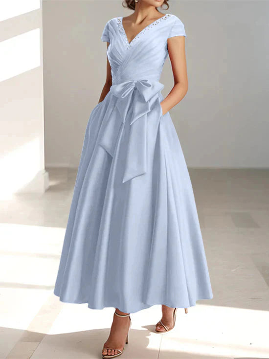 Abiti da mamma della sposa con tasche, scollo a V e stile principessa/a trapezio