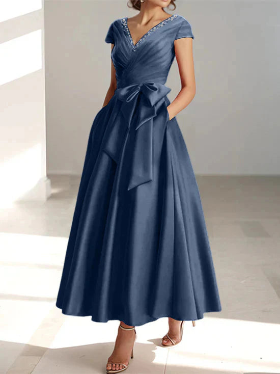 Abiti da mamma della sposa con tasche, scollo a V e stile principessa/a trapezio