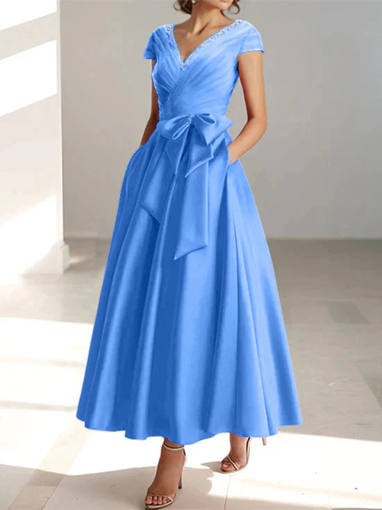 Abiti da mamma della sposa con tasche, scollo a V e stile principessa/a trapezio