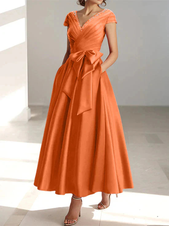 Vestidos de madre de la novia con escote en V, corte A/princesa y bolsillos