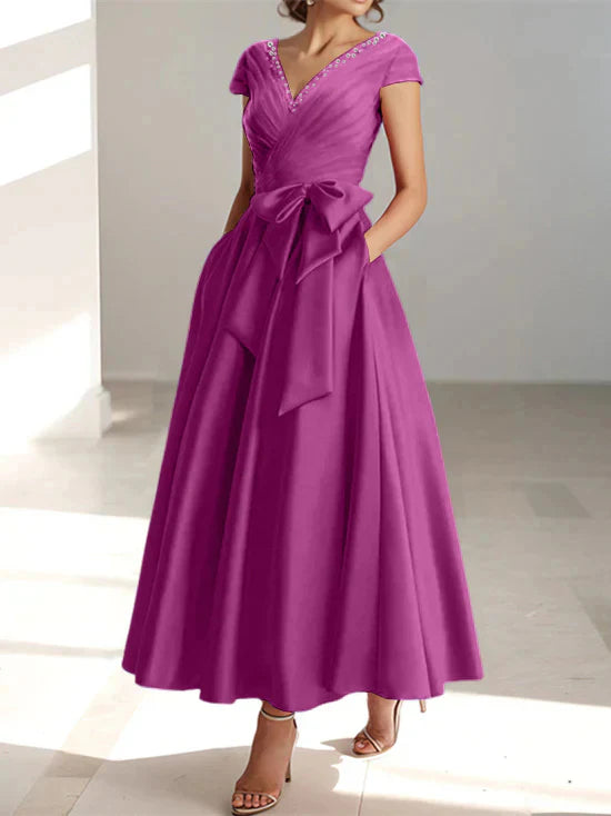 Abiti da mamma della sposa con tasche, scollo a V e stile principessa/a trapezio