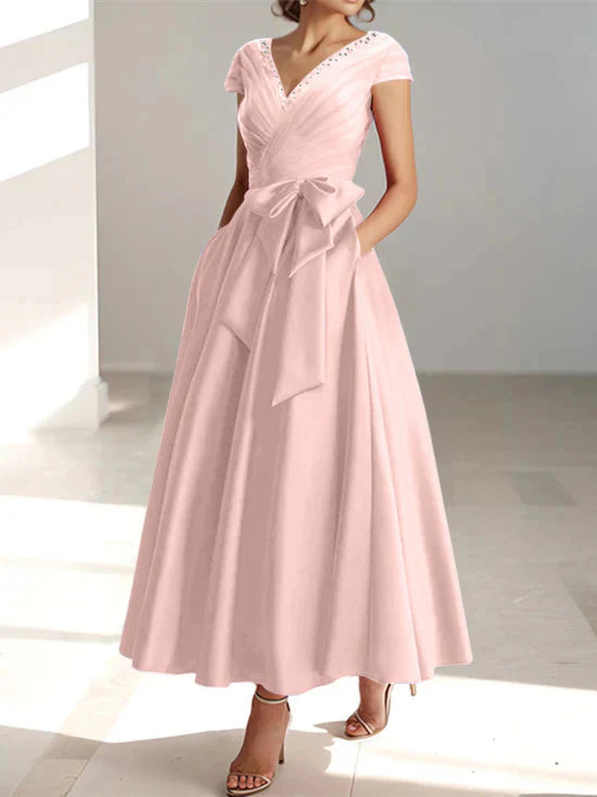 Abiti da mamma della sposa con tasche, scollo a V e stile principessa/a trapezio