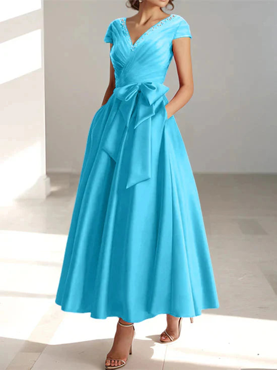 Abiti da mamma della sposa con tasche, scollo a V e stile principessa/a trapezio
