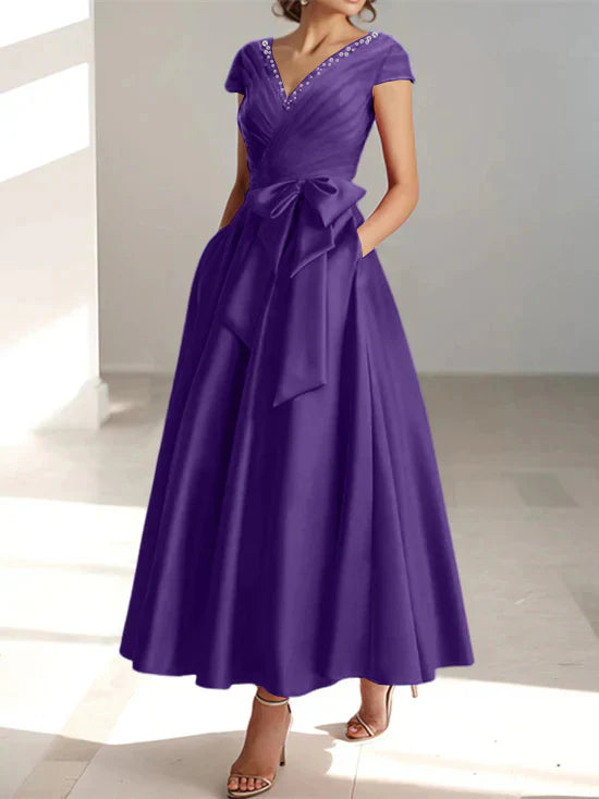 Abiti da mamma della sposa con tasche, scollo a V e stile principessa/a trapezio