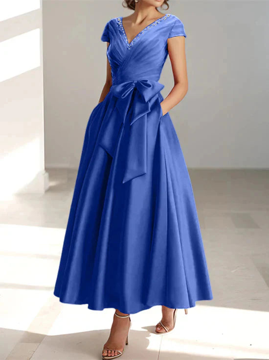 Abiti da mamma della sposa con tasche, scollo a V e stile principessa/a trapezio