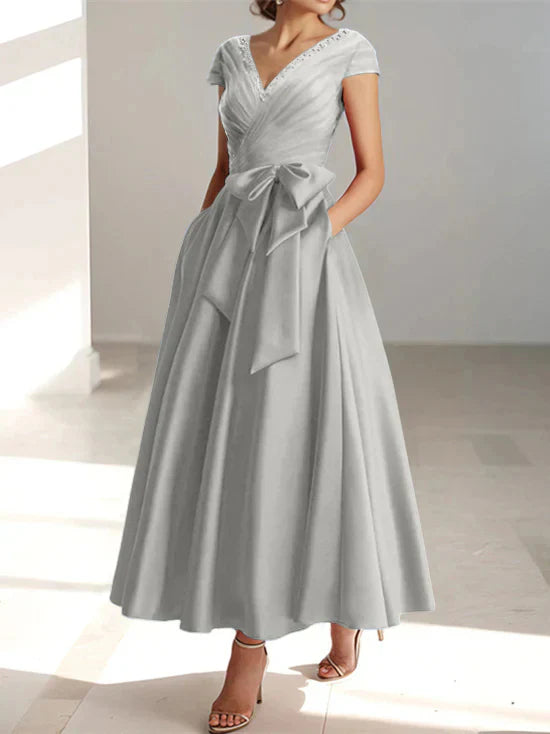 Abiti da mamma della sposa con tasche, scollo a V e stile principessa/a trapezio