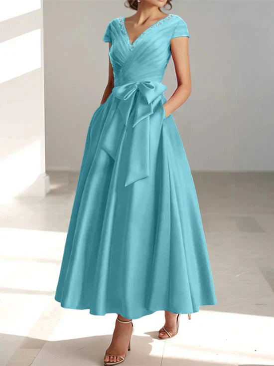 Abiti da mamma della sposa con tasche, scollo a V e stile principessa/a trapezio