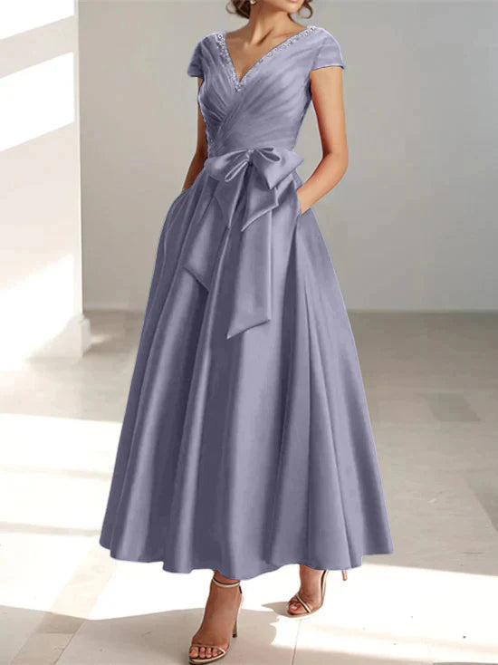 Vestidos de madre de la novia con escote en V, corte A/princesa y bolsillos