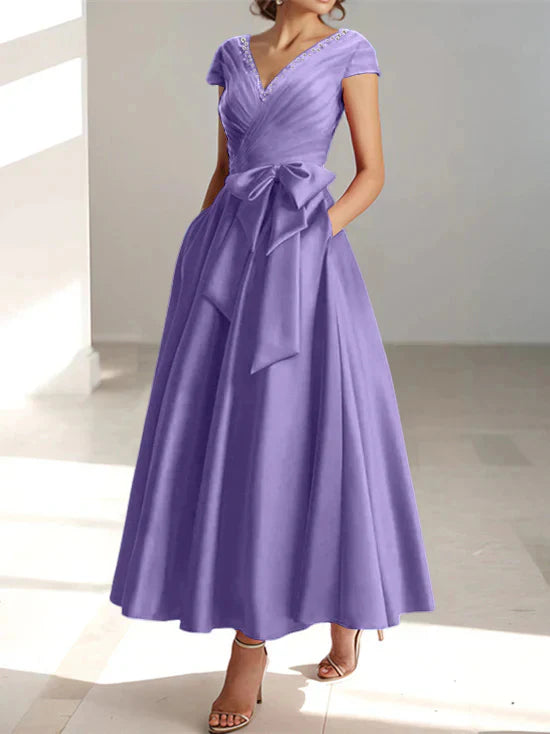 Abiti da mamma della sposa con tasche, scollo a V e stile principessa/a trapezio
