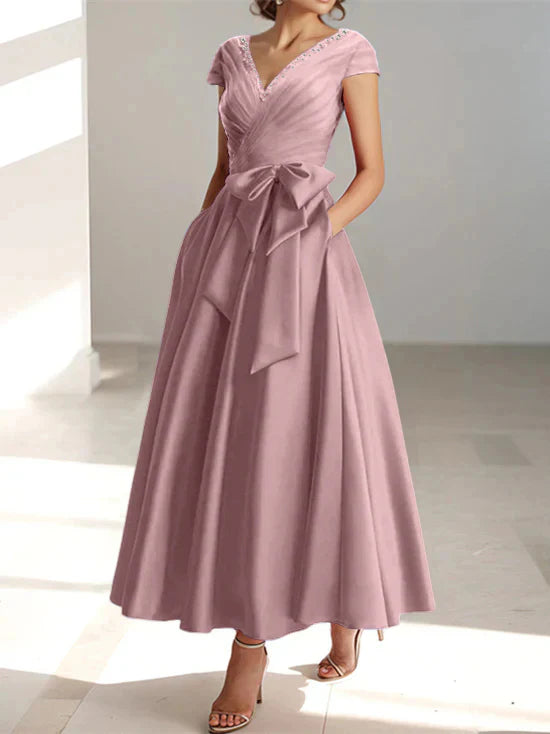 Abiti da mamma della sposa con tasche, scollo a V e stile principessa/a trapezio