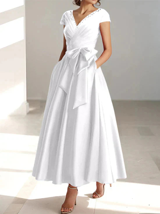 Abiti da mamma della sposa con tasche, scollo a V e stile principessa/a trapezio