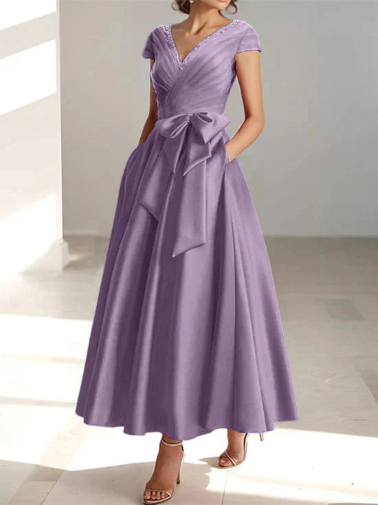 Abiti da mamma della sposa con tasche, scollo a V e stile principessa/a trapezio