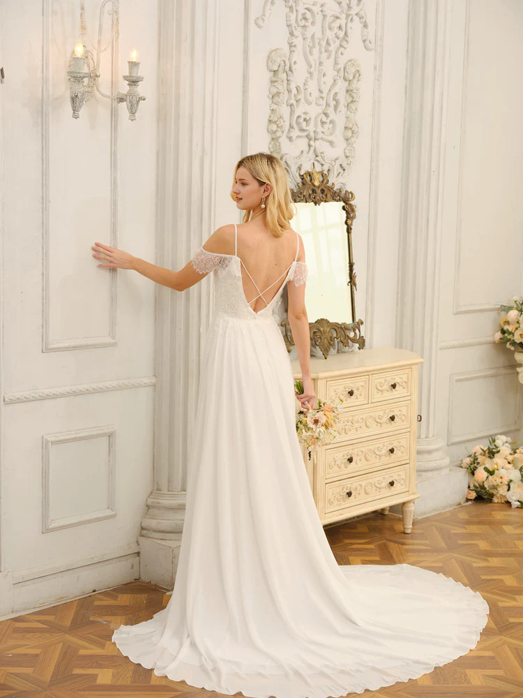 Vestido de novia largo estilo princesa con hombros descubiertos, corte A y pegatinas.