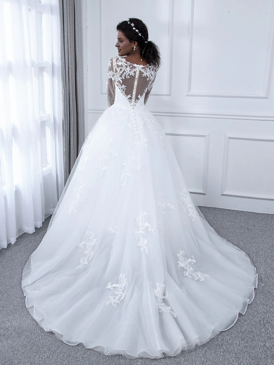 Vestido de novia de gasa con cuello transparente, mangas largas y apliques