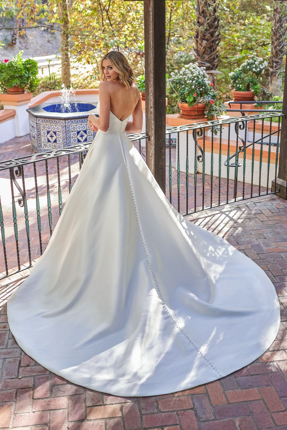 Simple deep V-neck strapless and floor length wedding dress