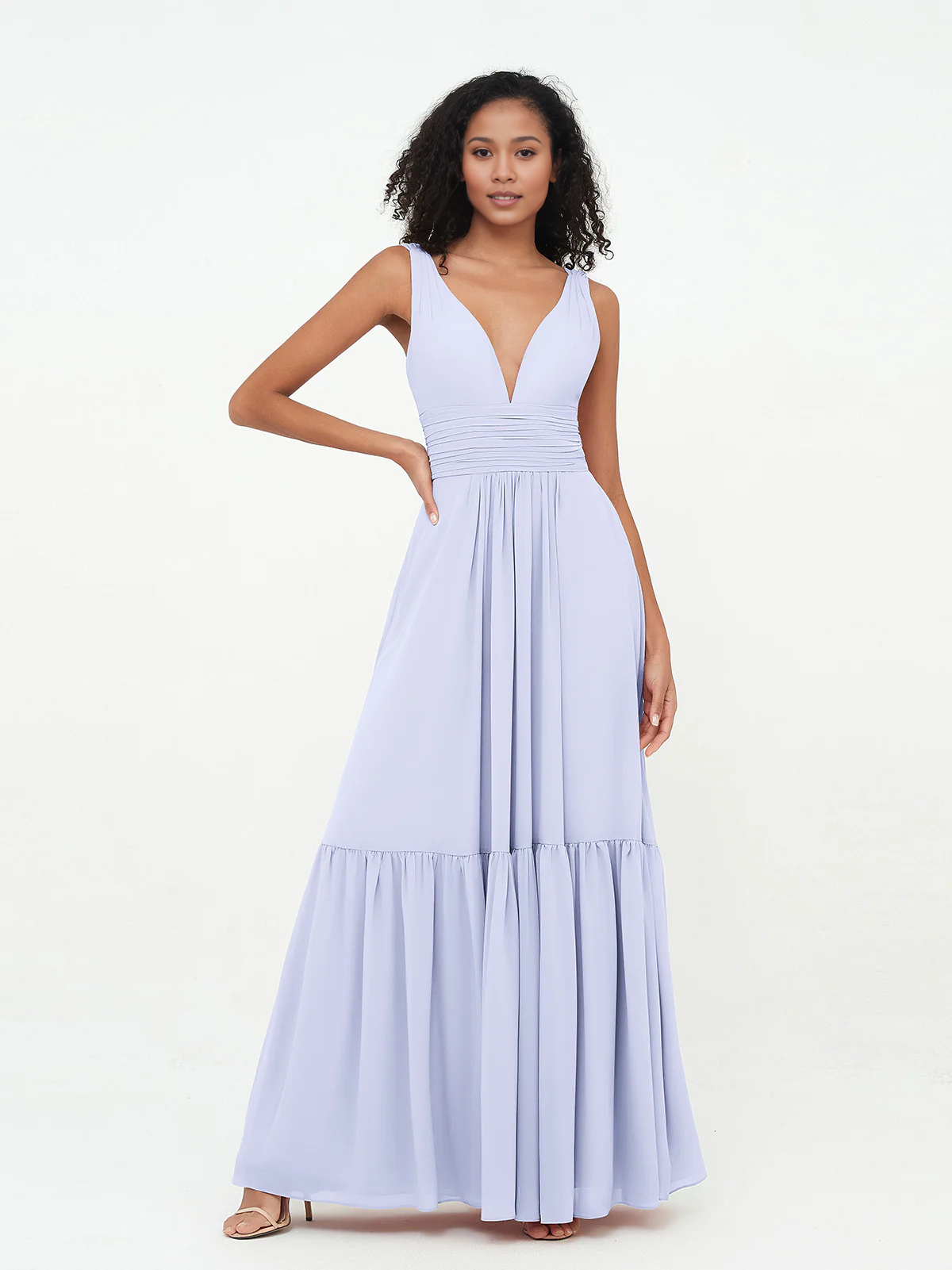 Vestido estilo bohemio con falda en capas de gasa y escote en V profundo