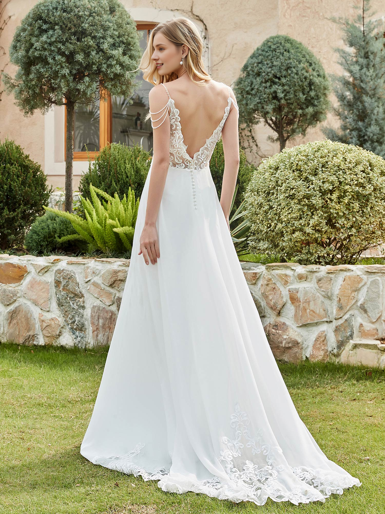 Vestido de novia de gasa con encaje y botones en forma de A
