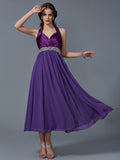 Abiti da damigella d'onore lunghi in chiffon con perline, senza maniche, stile principessa/a trapezio