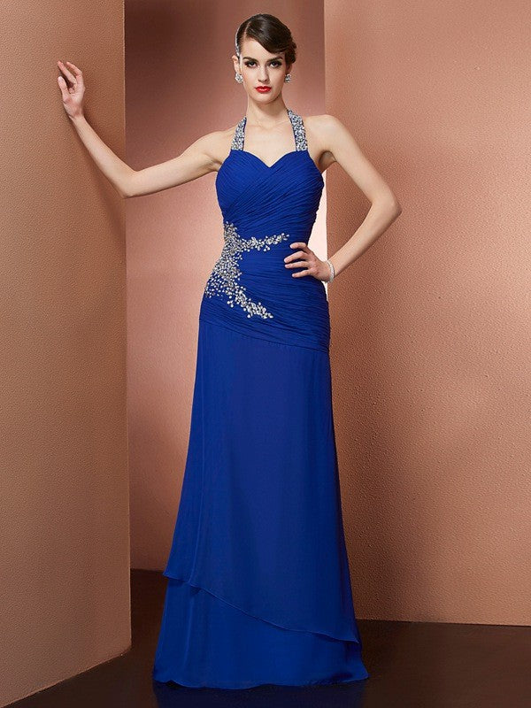 Vestidos largos de gasa con cuello halter, sin mangas y con abalorios