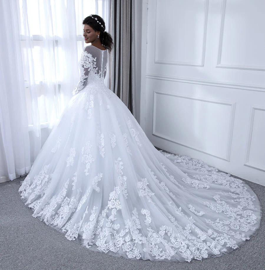 Vestido de novia de gasa de manga larga con cuello transparente y calcomanía con adorno de perlas