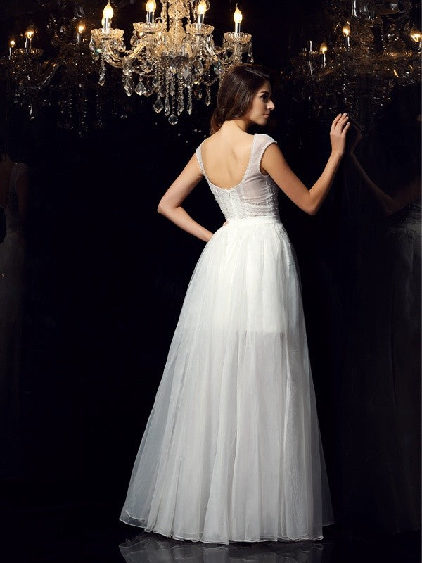 Vestidos largos de tul con corte A/princesa, escote redondo, mangas cortas y abalorios