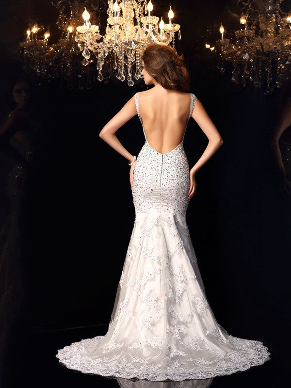 Vestidos largos de tul sin mangas con escote trompeta/sirena y cuentas