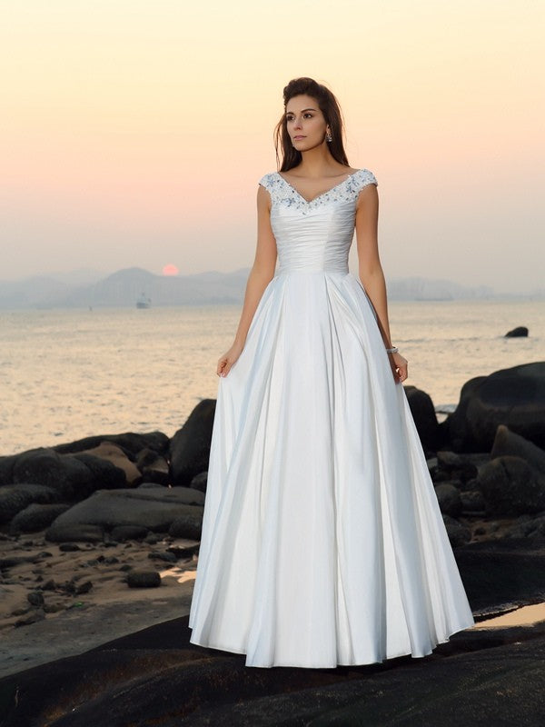 Vestidos de novia largos de tafetán para playa, corte A/princesa, escote en V, sin mangas y con cuentas