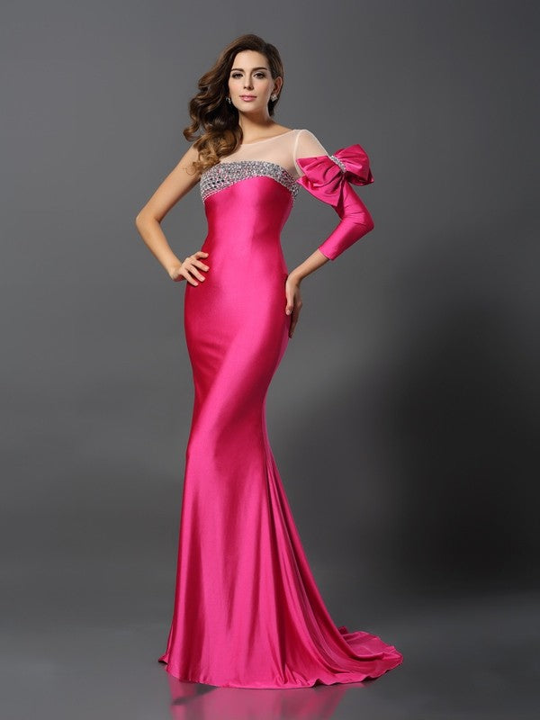 Vestidos largos de licra con escote barco, manga larga y lazo, corte trompeta/sirena
