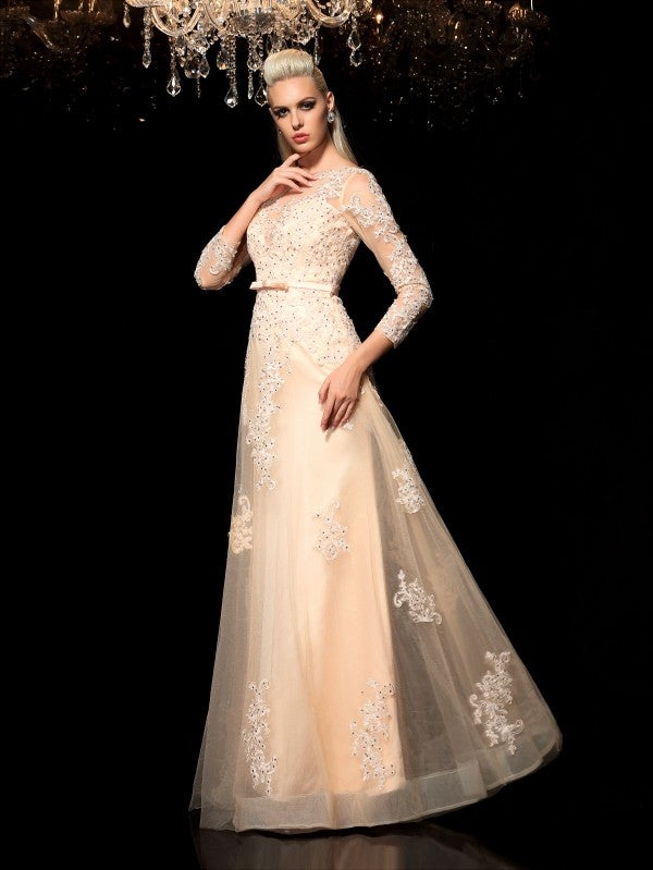Vestidos largos de satén con escote transparente, mangas largas y apliques, corte A/princesa