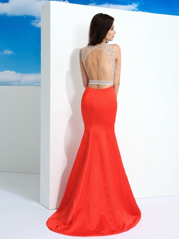 Vestidos largos de satén sin mangas con cuello transparente y cuentas de corte trompeta/sirena