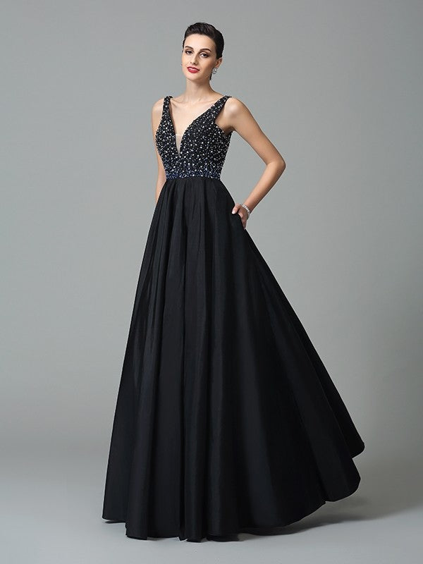 Vestidos largos de tafetán sin mangas con tirantes princesa y cuentas