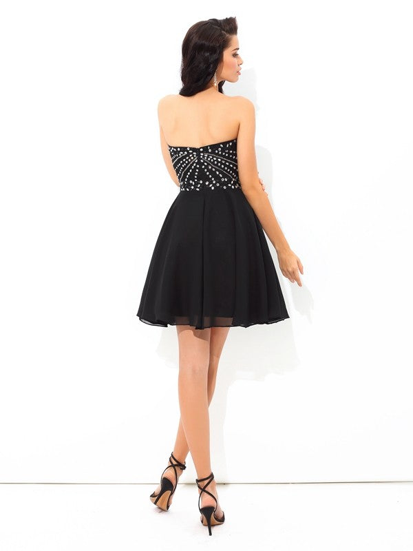 Vestidos de cóctel cortos de gasa sin mangas con escote corazón y lentejuelas, corte A/princesa