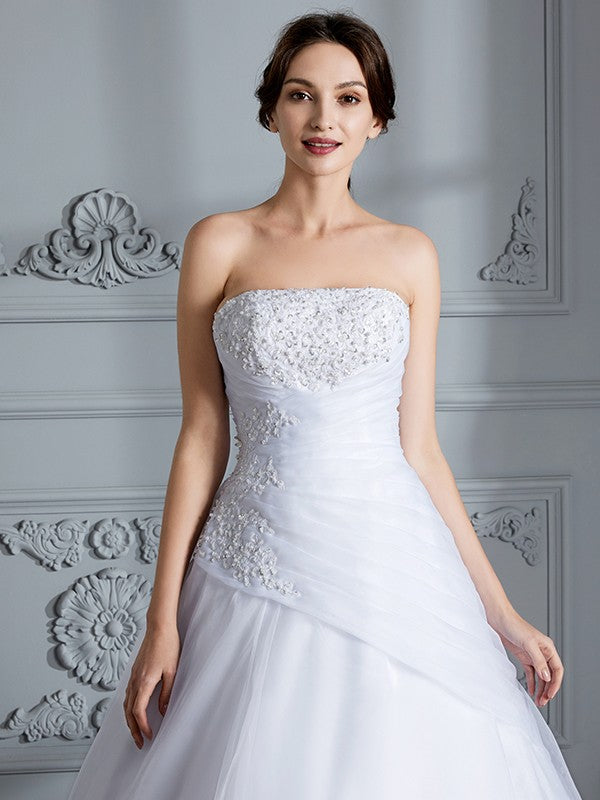 Vestidos de novia de organza con cola de corte sin mangas y sin tirantes