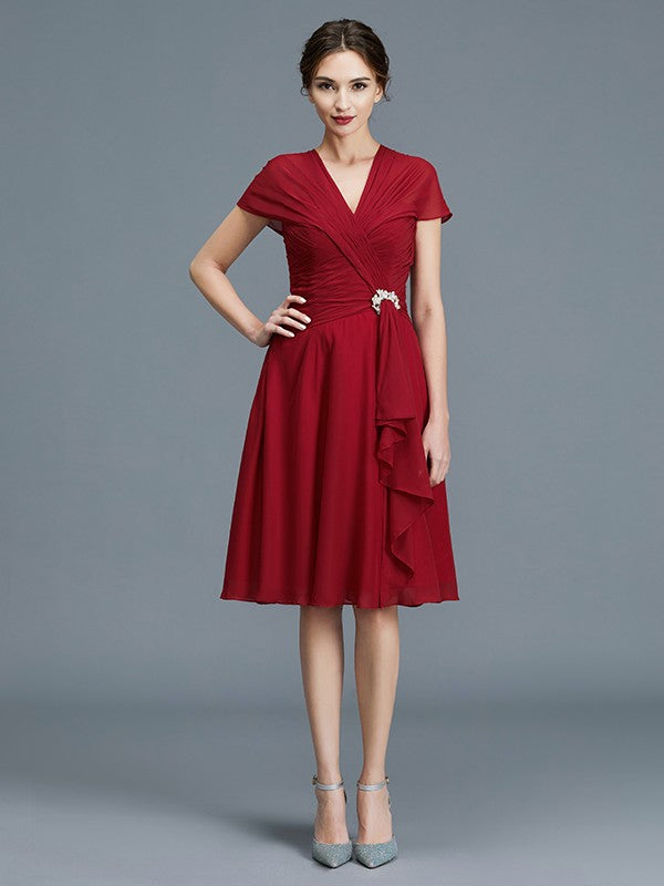 Vestidos de madre de la novia de corte A/princesa, escote en V, gasa, sin mangas, hasta la rodilla, con volantes