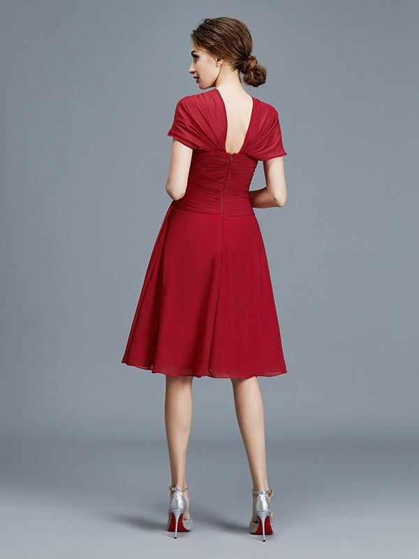 Vestidos de madre de la novia de corte A/princesa, escote en V, gasa, sin mangas, hasta la rodilla, con volantes