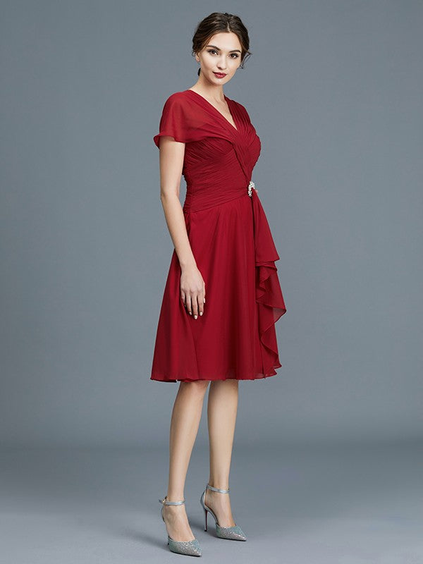 Vestidos de madre de la novia de corte A/princesa, escote en V, gasa, sin mangas, hasta la rodilla, con volantes