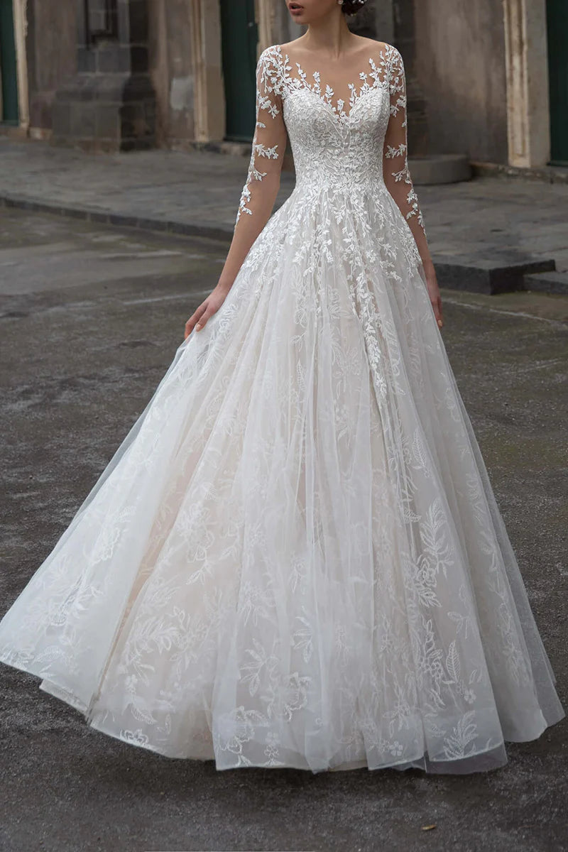 Abito da sposa a maniche lunghe in pizzo con scollatura a trapezio